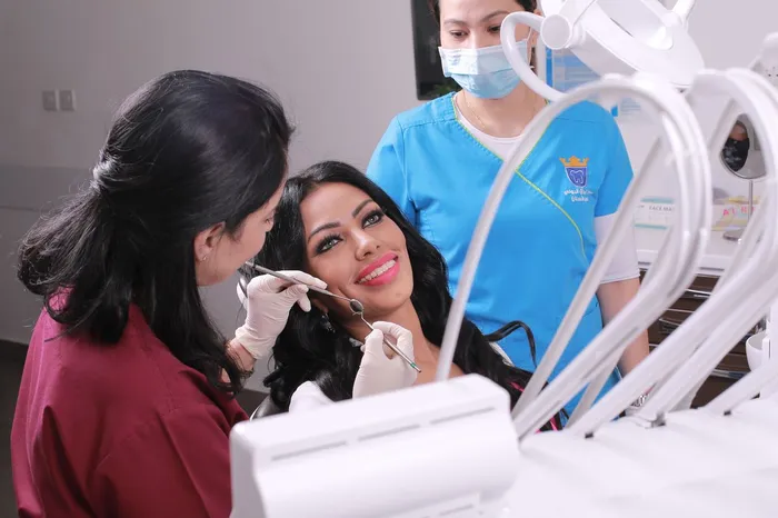 Happy dental patient at a safe, accredited dental clinic — a positive outcome achieved by choosing a reputable clinic in Turkey with proper safety protocols